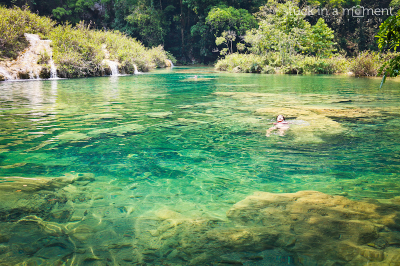 Dee wades through the freshwater pools at Semuc Champey